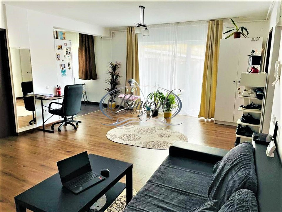 Apartament cu gradina si parcare