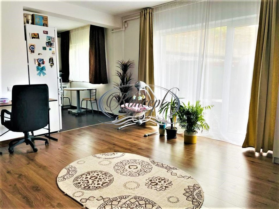 Apartament cu gradina si parcare