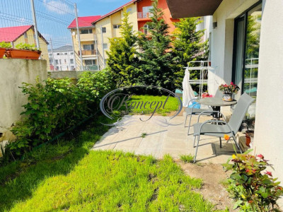 Apartament cu gradina si parcare