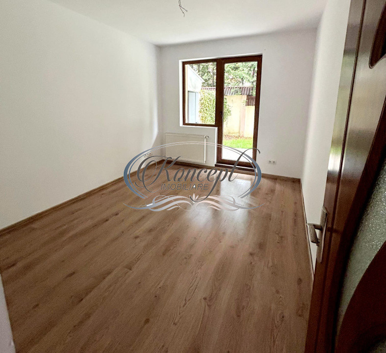 Apartament cu gradina si parcare
