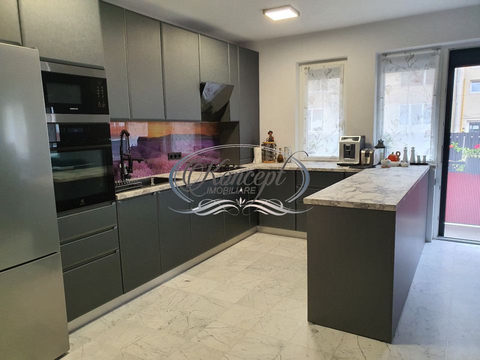 Apartament cu gradina si 2 parcari in zona Tera