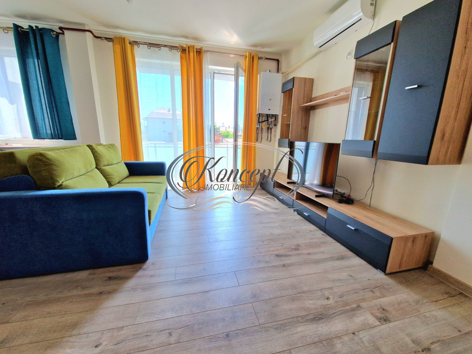 Locuinta complet mobilata cu balcon insorit si parcare, zona business
