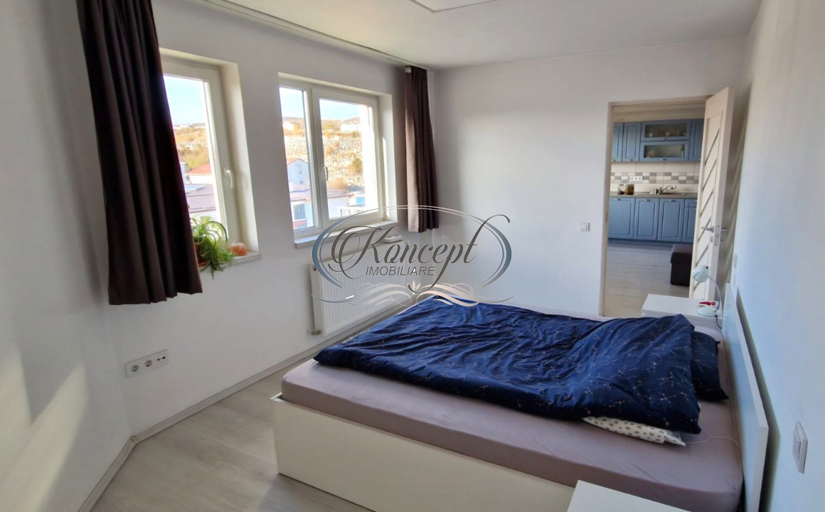 Locuinta luminoasa cu balcon si garaj subteran