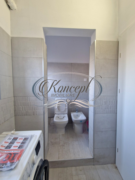 Proprietate renovata cu boxa generoasa pe Bulevardul 21 Decembrie