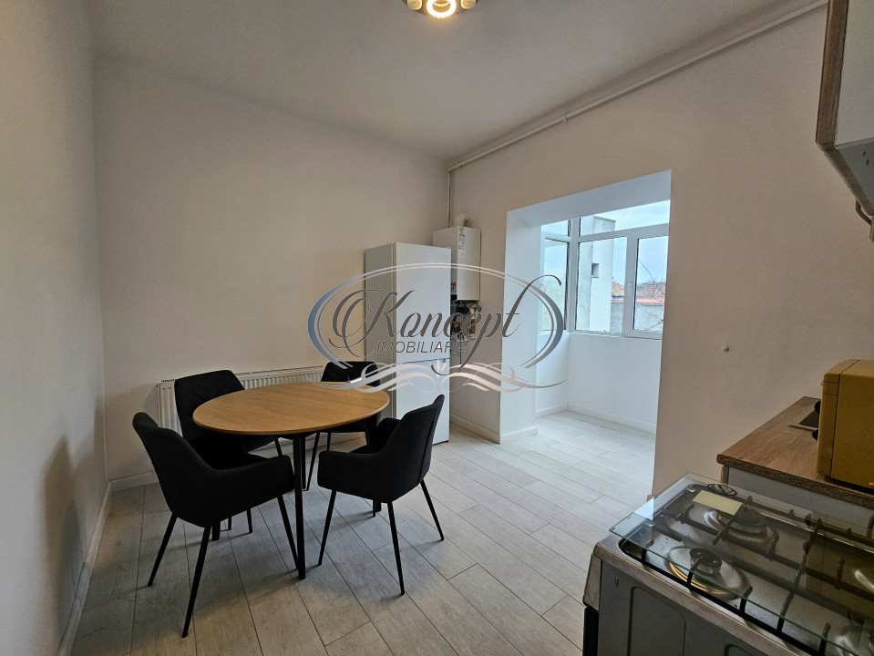 Proprietate renovata cu boxa generoasa pe Bulevardul 21 Decembrie