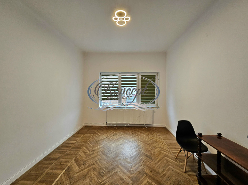 Proprietate renovata cu boxa generoasa pe Bulevardul 21 Decembrie