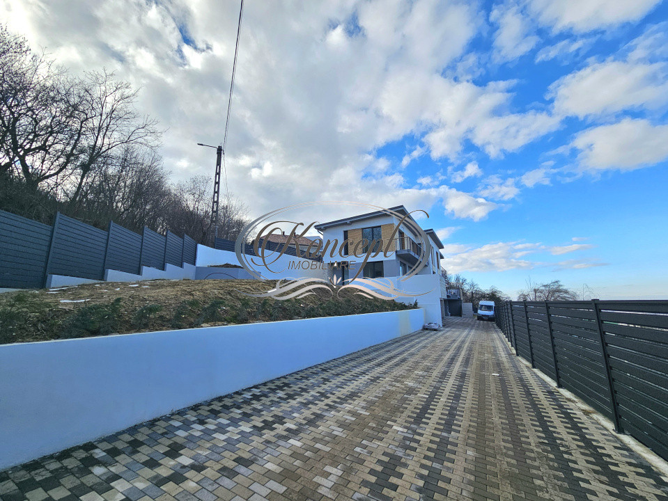 Locuinta D+P+1 Feleacu cu spatii vitrate ample