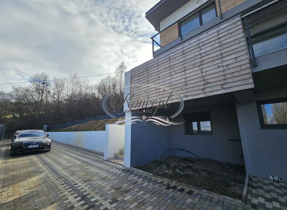 Locuinta D+P+1 Feleacu cu spatii vitrate ample