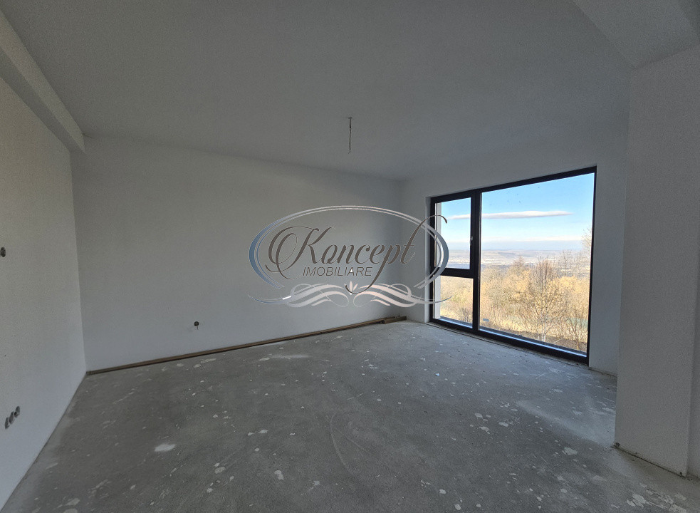 Locuinta D+P+1 Feleacu cu spatii vitrate ample