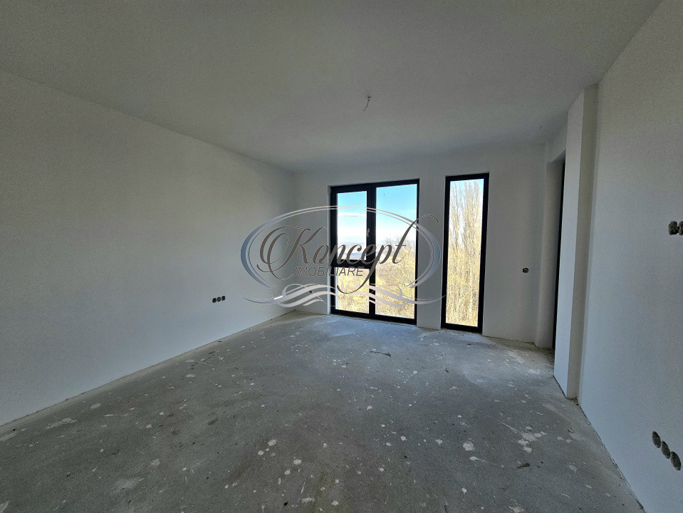 Locuinta D+P+1 Feleacu cu spatii vitrate ample