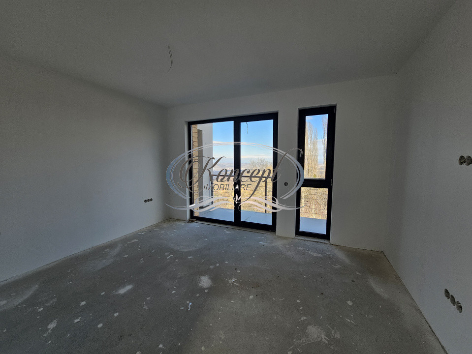Locuinta D+P+1 Feleacu cu spatii vitrate ample