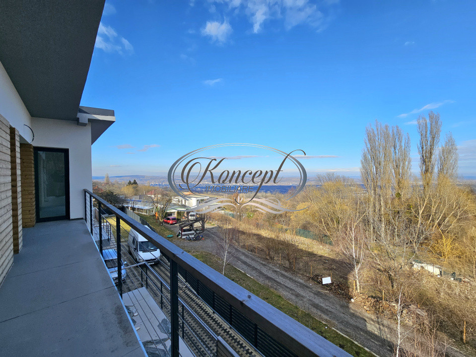 Locuinta D+P+1 Feleacu cu spatii vitrate ample