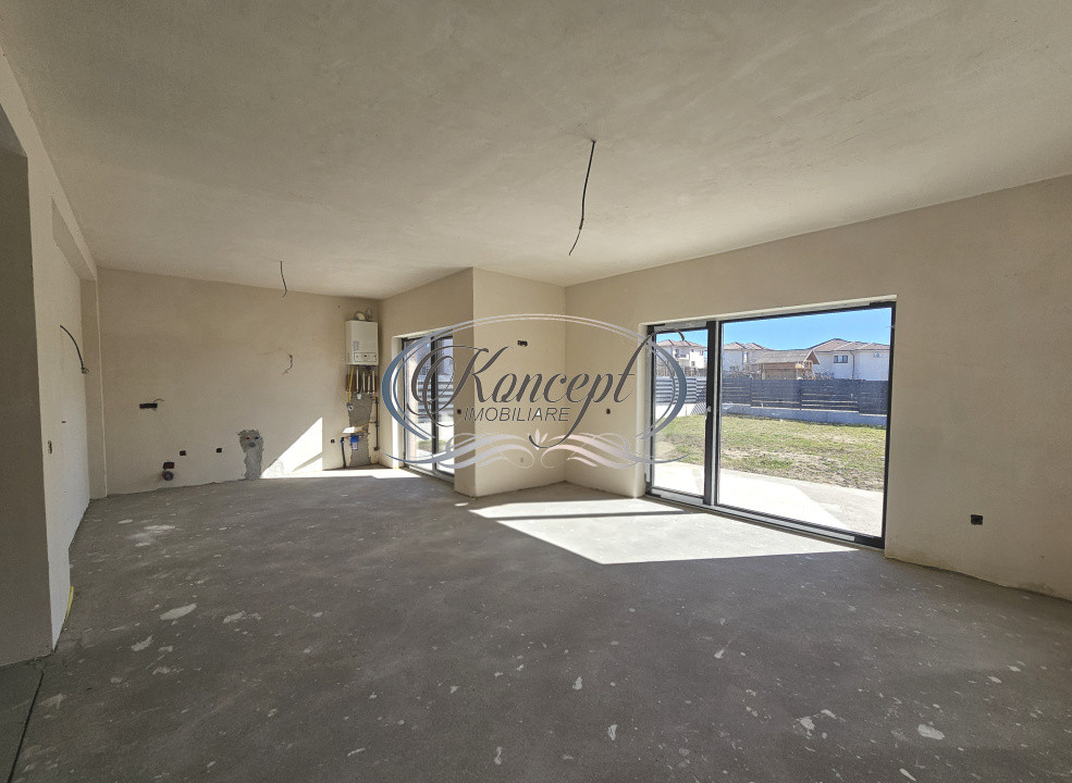 Locuinta moderna cu design cubic si curte plana in Dezmir