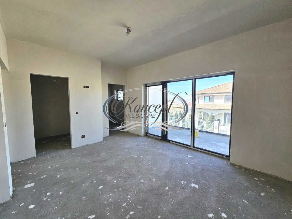 Locuinta moderna cu design cubic si curte plana in Dezmir