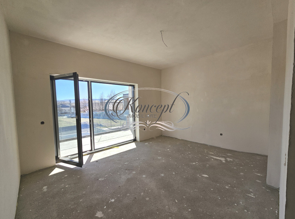 Locuinta moderna cu design cubic si curte plana in Dezmir