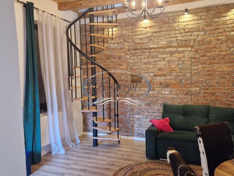 Apartament tip casa cu terasa si curte cu acces separat in Marasti