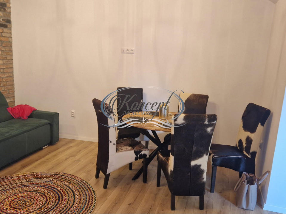 Apartament tip casa cu terasa si curte cu acces separat in Marasti