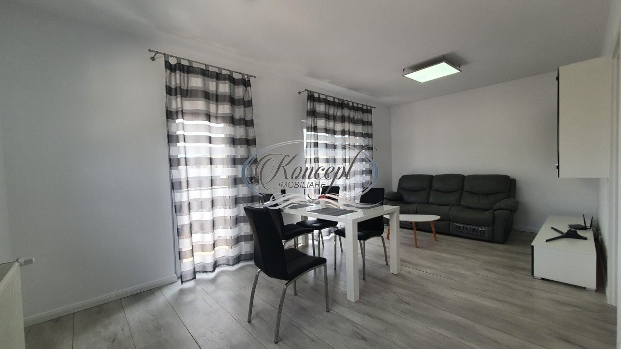 Apartament cu 3 camere si loc de parcare